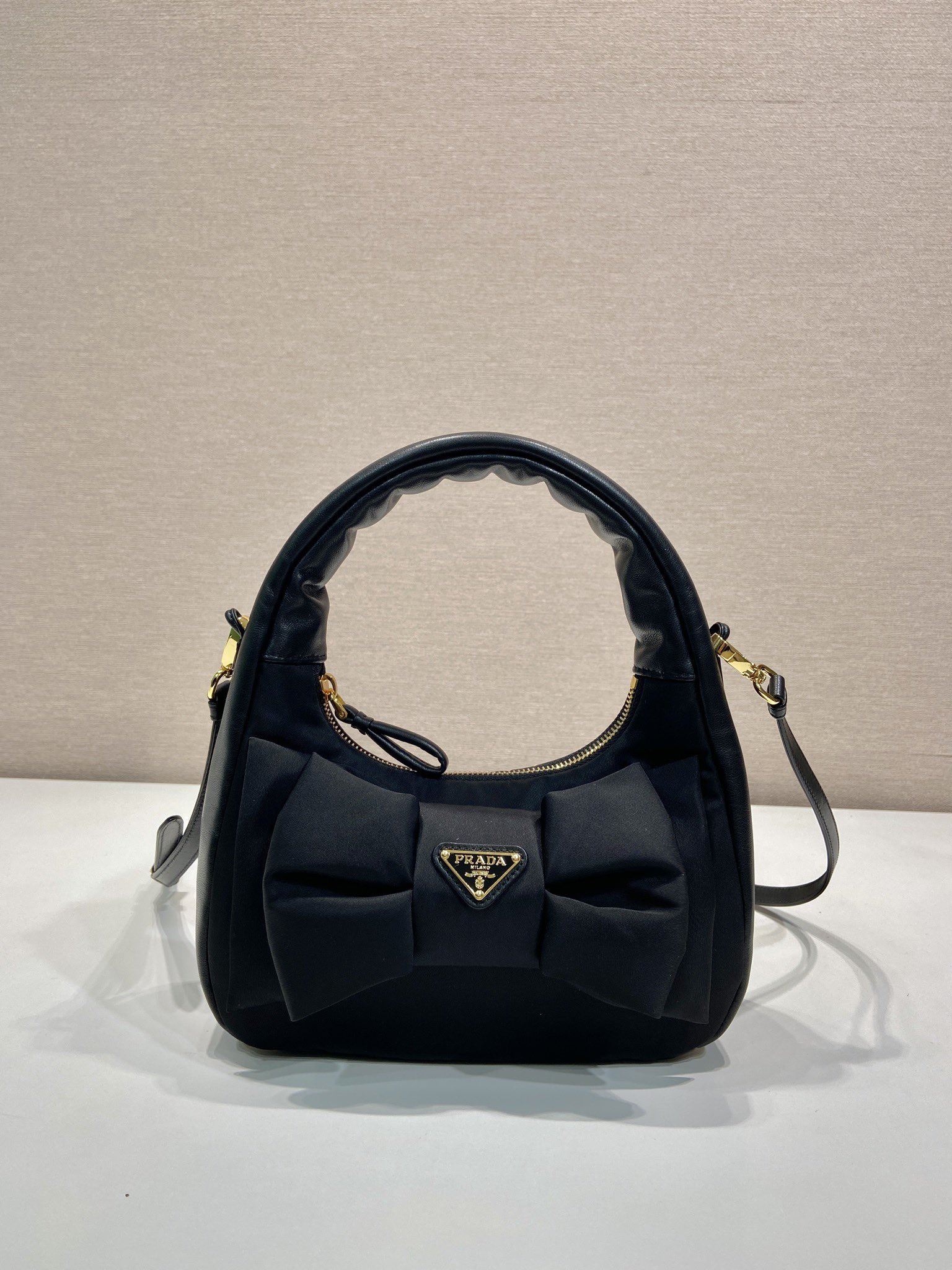 Pra*a top handle bags